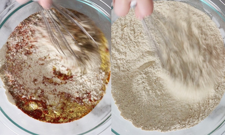 Two image side-by-side both showing a hand whisking dry ingredients in a large glass bowl. On the left there's lots of clumps of spices through the flour and on the right the mixture is an even color.