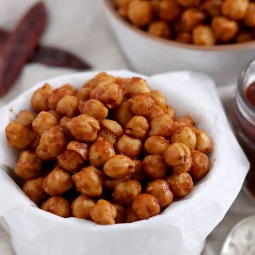 Close up of a small bowl of barbecue roasted chickpeas.
