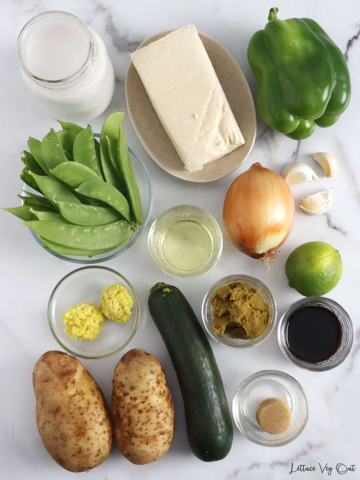 Arrangement of ingredients for green tofu curry.