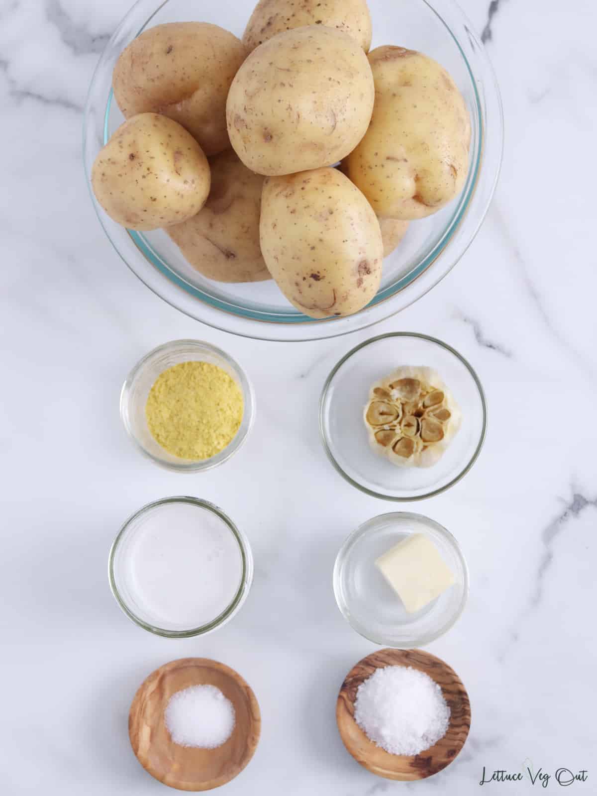 Bowls of ingredients for dairy free garlic mashed potatoes.
